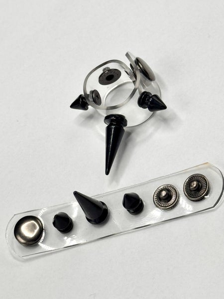 RIvet hairtie, clear with black  rivets